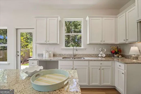 $305,400 | 2561 Riverside Court Northeast, Conyers, GA 30013