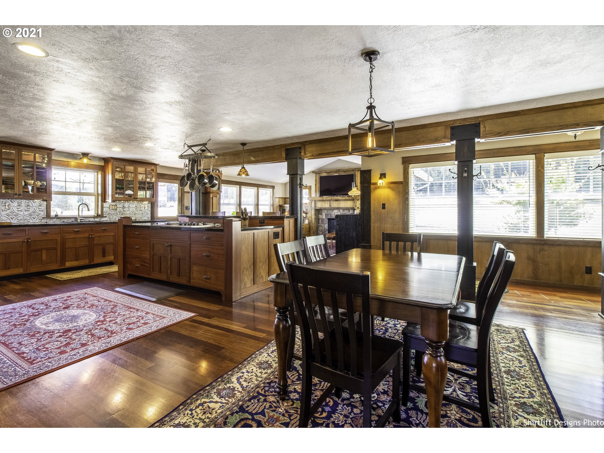 37170 Camp Creek Road Springfield, OR 97478 - Photo 16 of 29 a view of a dining room with furniture window and wooden floor