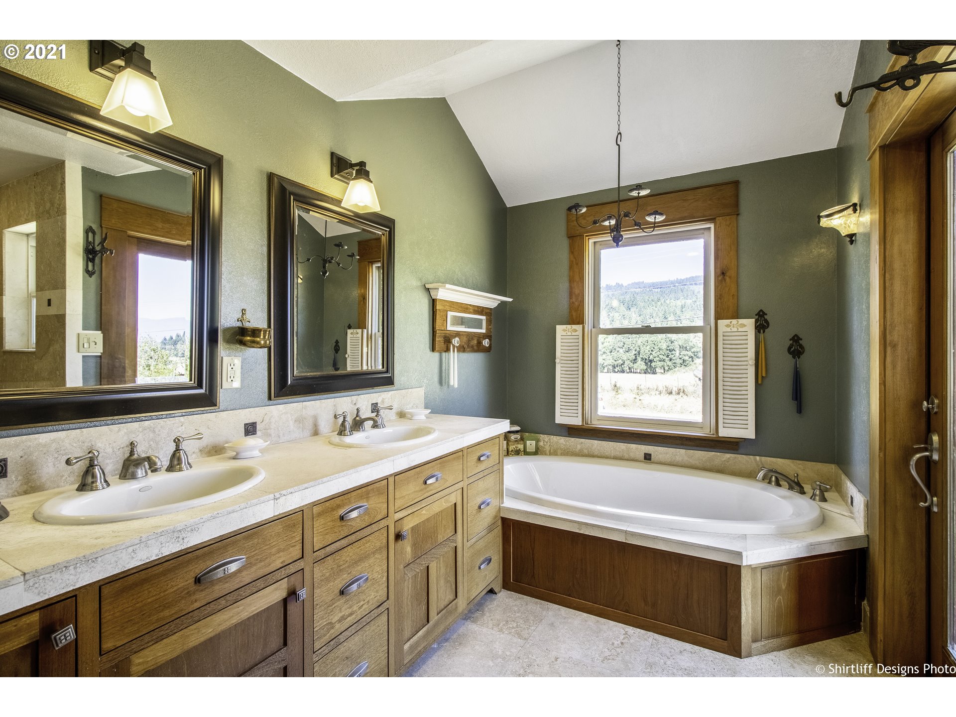 37170 Camp Creek Road Springfield, OR 97478 - Photo 18 of 29 a bathroom with a tub sink and mirror