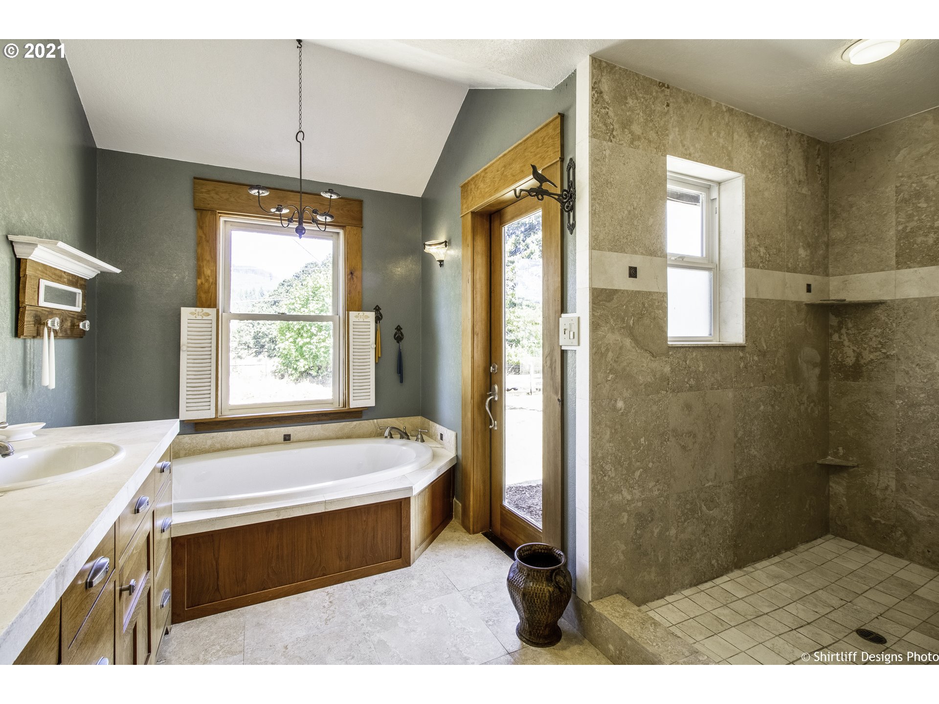 37170 Camp Creek Road Springfield, OR 97478 - Photo 19 of 29 a bathroom with a tub sink shower and a mirror