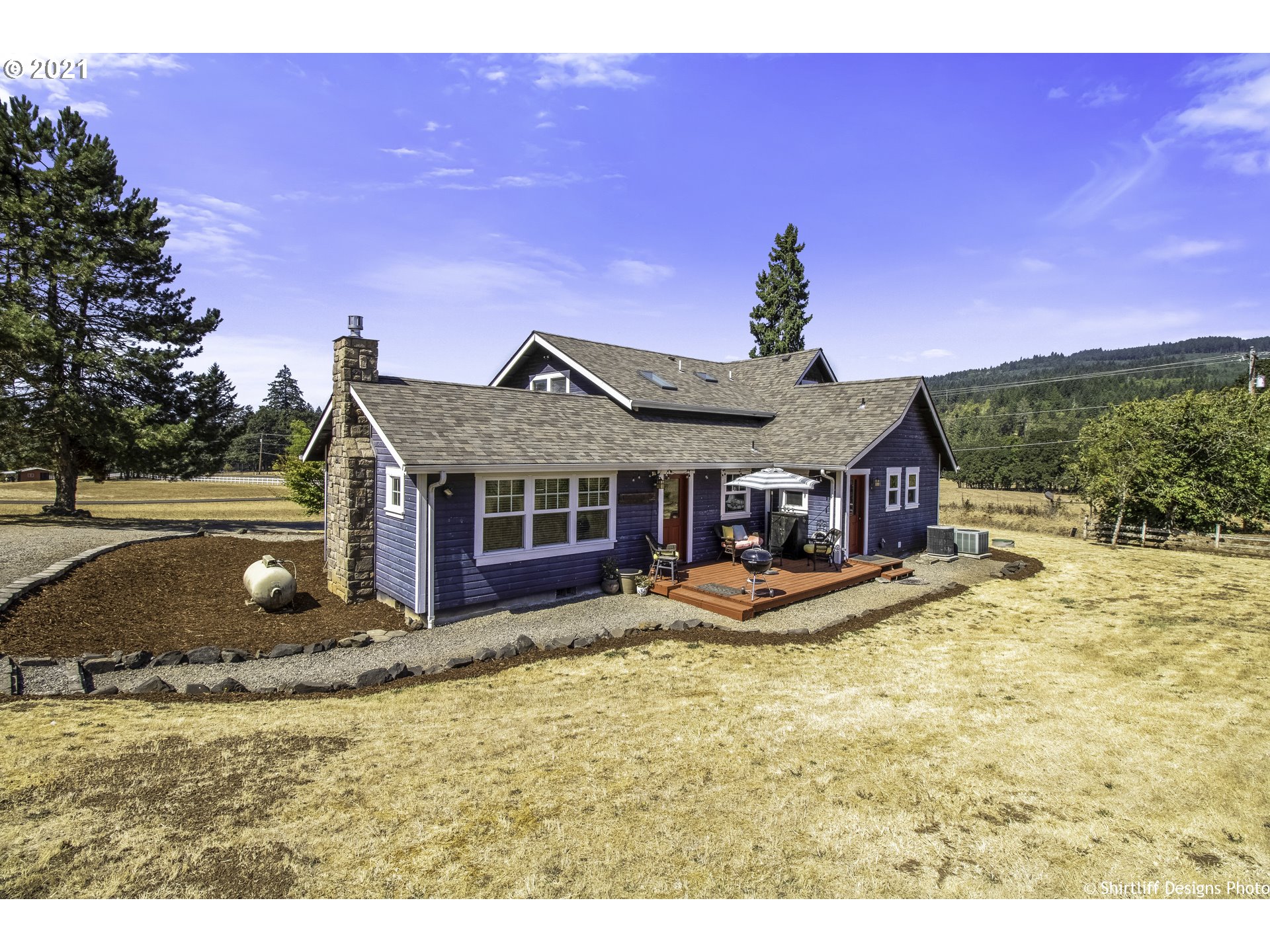 37170 Camp Creek Road Springfield, OR 97478 - Photo 3 of 29 a view of a big house with a big yard and potted plants