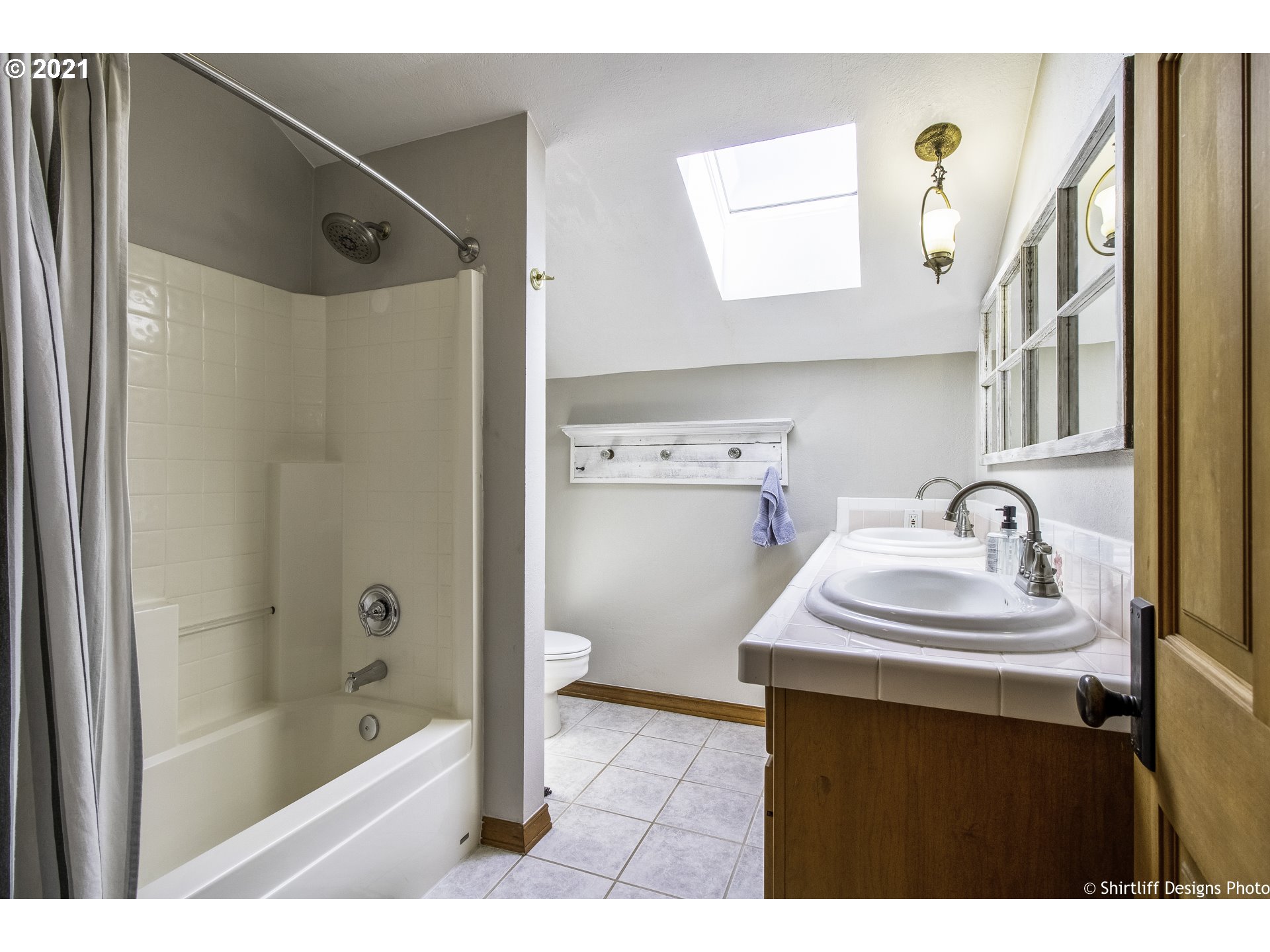 37170 Camp Creek Road Springfield, OR 97478 - Photo 22 of 29 a bathroom with a sink a toilet and shower