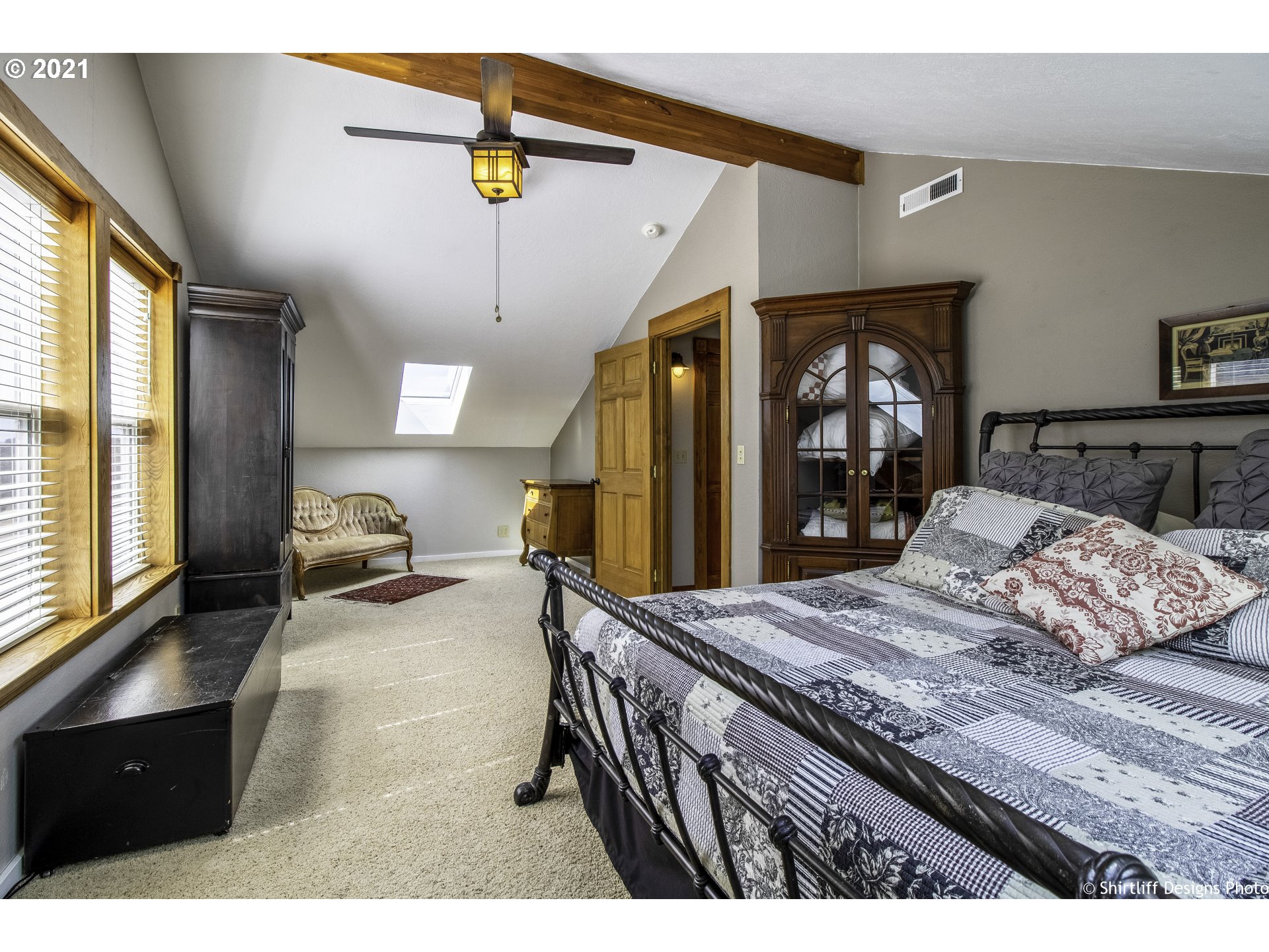 37170 Camp Creek Road Springfield, OR 97478 - Photo 23 of 29 a bedroom with a bed a large window and walk in closet
