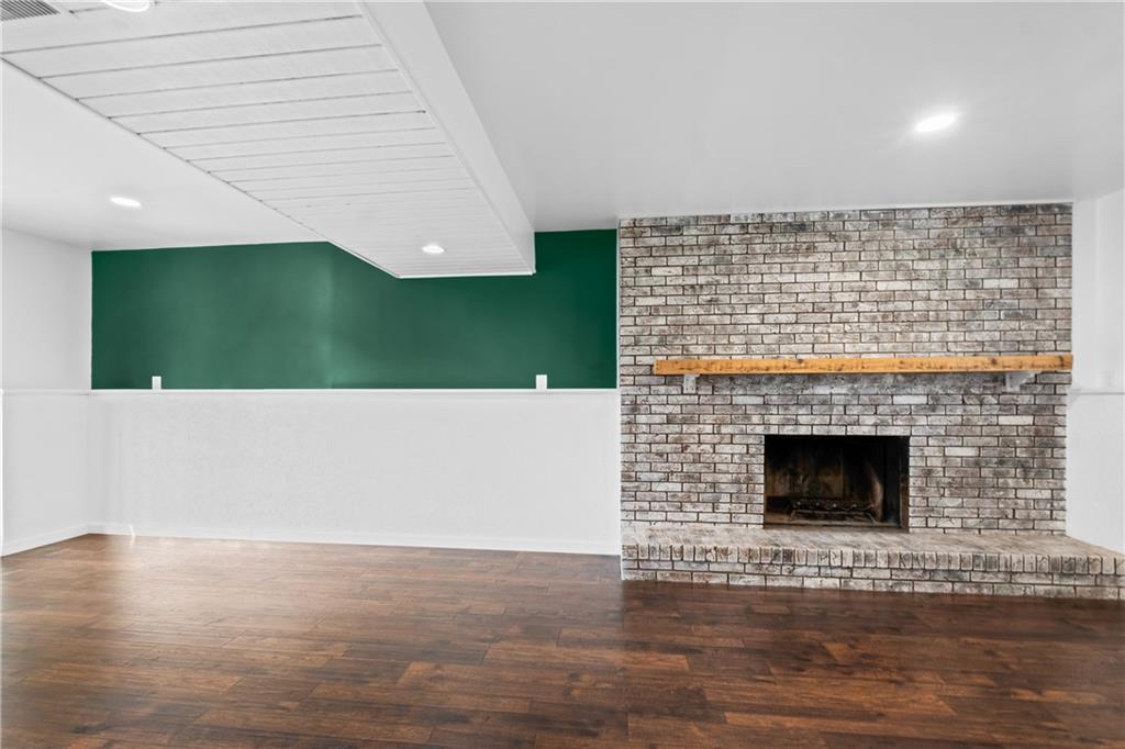 230 Dodd Drive Washington, PA 15301 - Photo 12 of 49 a view of an empty room with kitchen and fireplace