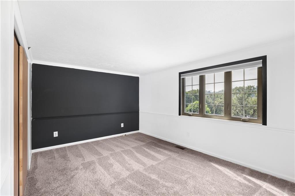 230 Dodd Drive Washington, PA 15301 - Photo 19 of 49 a view of an empty room with a window