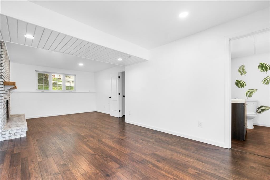 230 Dodd Drive Washington, PA 15301 - Photo 26 of 49 a view of an empty room with wooden floor and a window