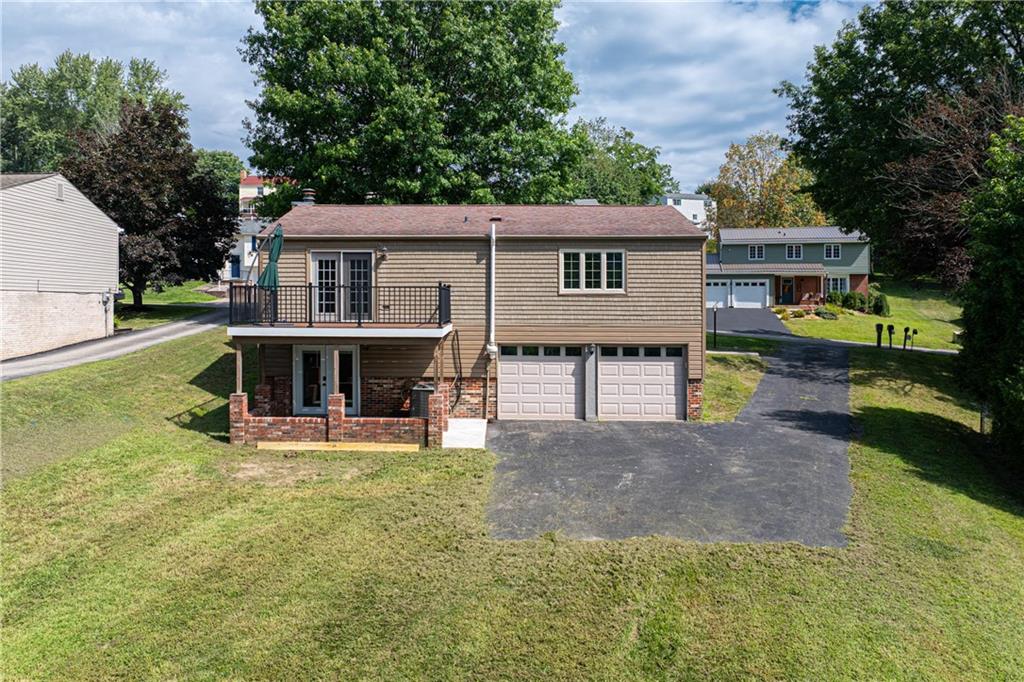 230 Dodd Drive Washington, PA 15301 - Photo 33 of 49 a view of a house with a yard and sitting area