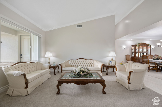 230 Boulder Way Leeds, UT 84746 - Photo 5 of 72 Formal living / dining rooms featuring crown molding, carpet & tile flooring, and high vaulted ceiling, three-tone paint, vaulted ceilings and recessed lighting