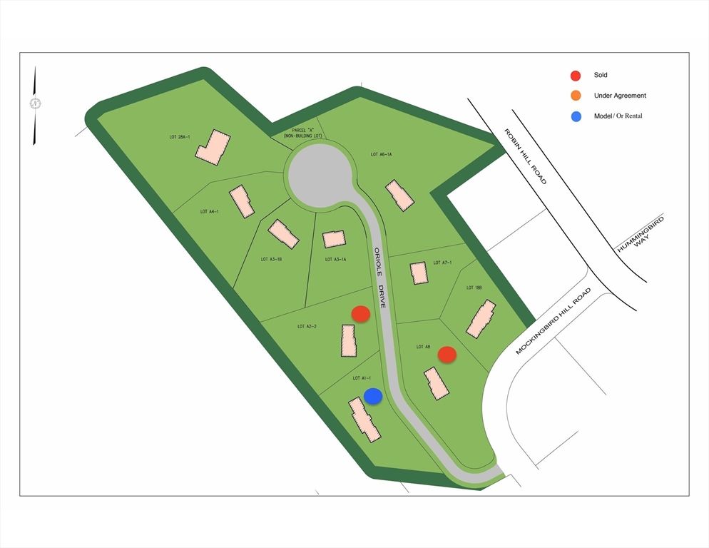 20 Oriole Drive Groton, MA 01450 - Photo 2 of 8 a view of a play room with toys and refrigerator