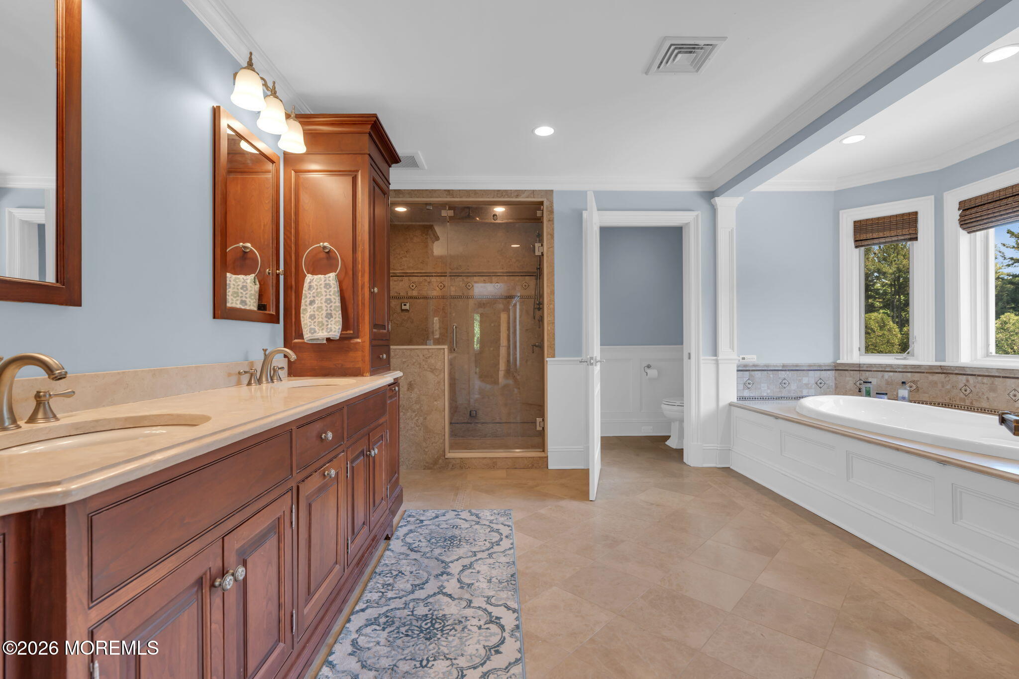 672 Winding River Road Brick, NJ 08724 - Photo 43 of 111 a bathroom with a double vanity sink a mirror and a bathtub