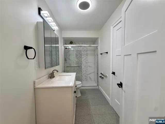 a view of balcony with deck and wooden floor
