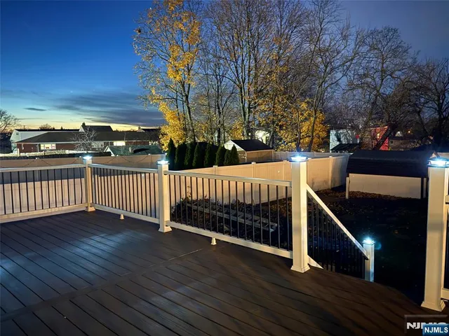a view of a balcony with chairs