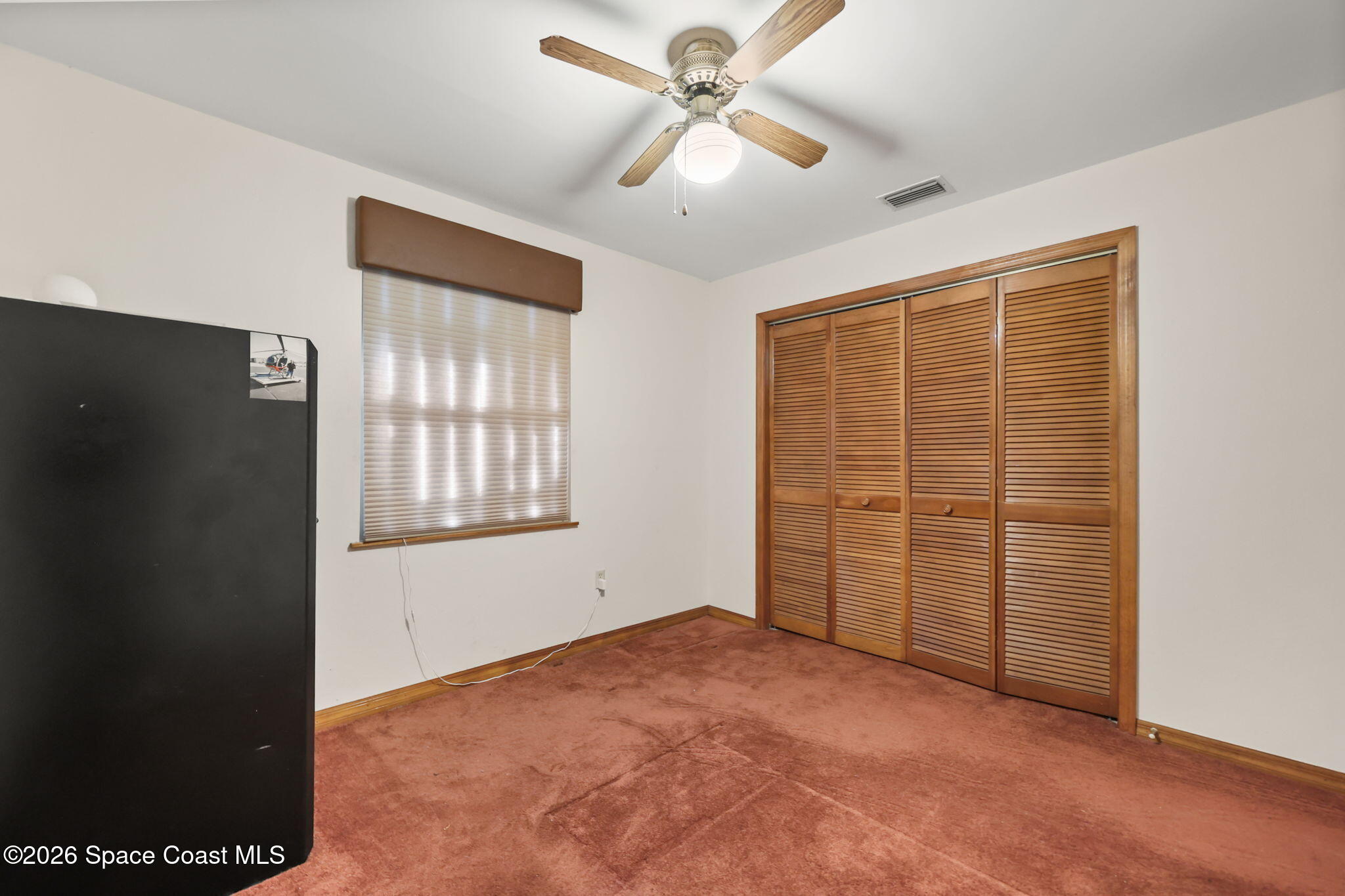 7256 Bright Avenue Cocoa, FL 32927 - Photo 17 of 29 Guest bedroom