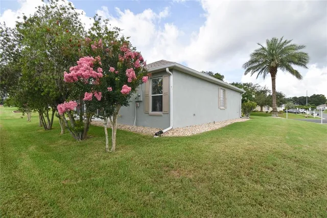 a house view with a garden space