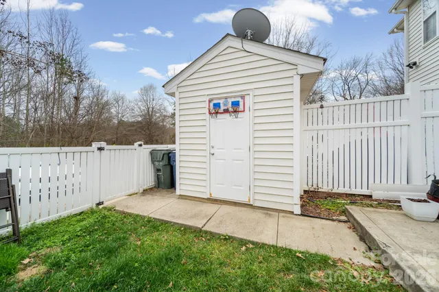 a front view of a house with a garage