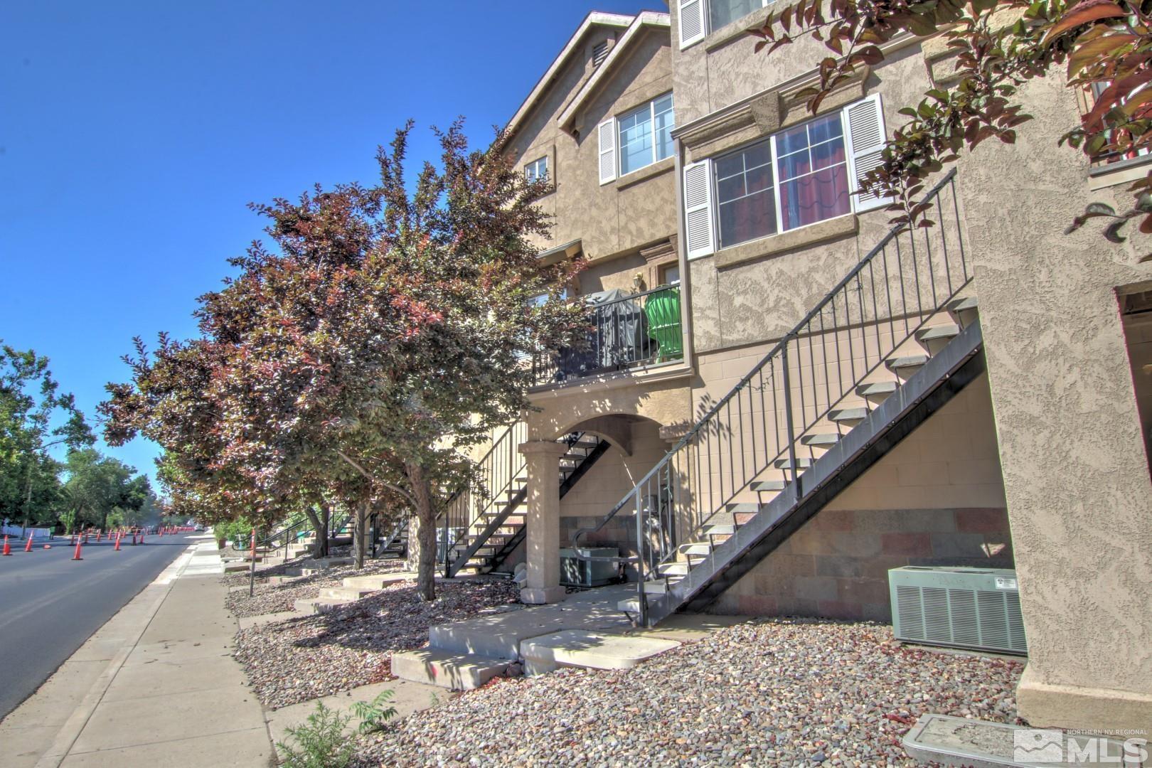 421 Holcomb Avenue Reno, NV 89502 - Photo 4 of 8 a view of a building with wooden stairs