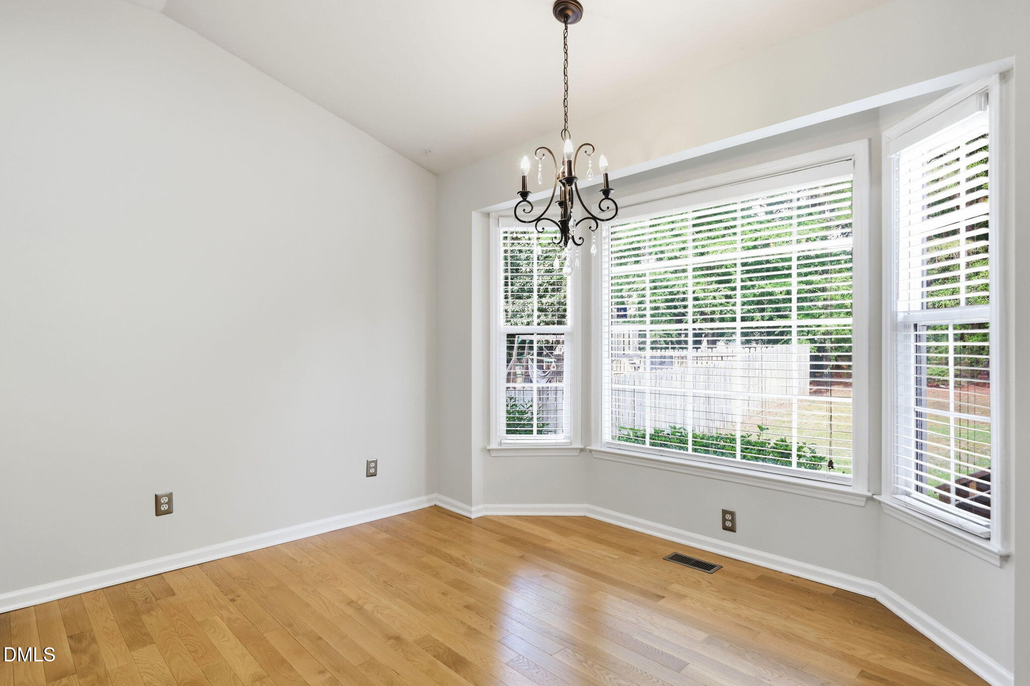 2912 Sedgefield Pines Lane Raleigh, NC 27604 - Photo 17 of 45 a view of an empty room with windows