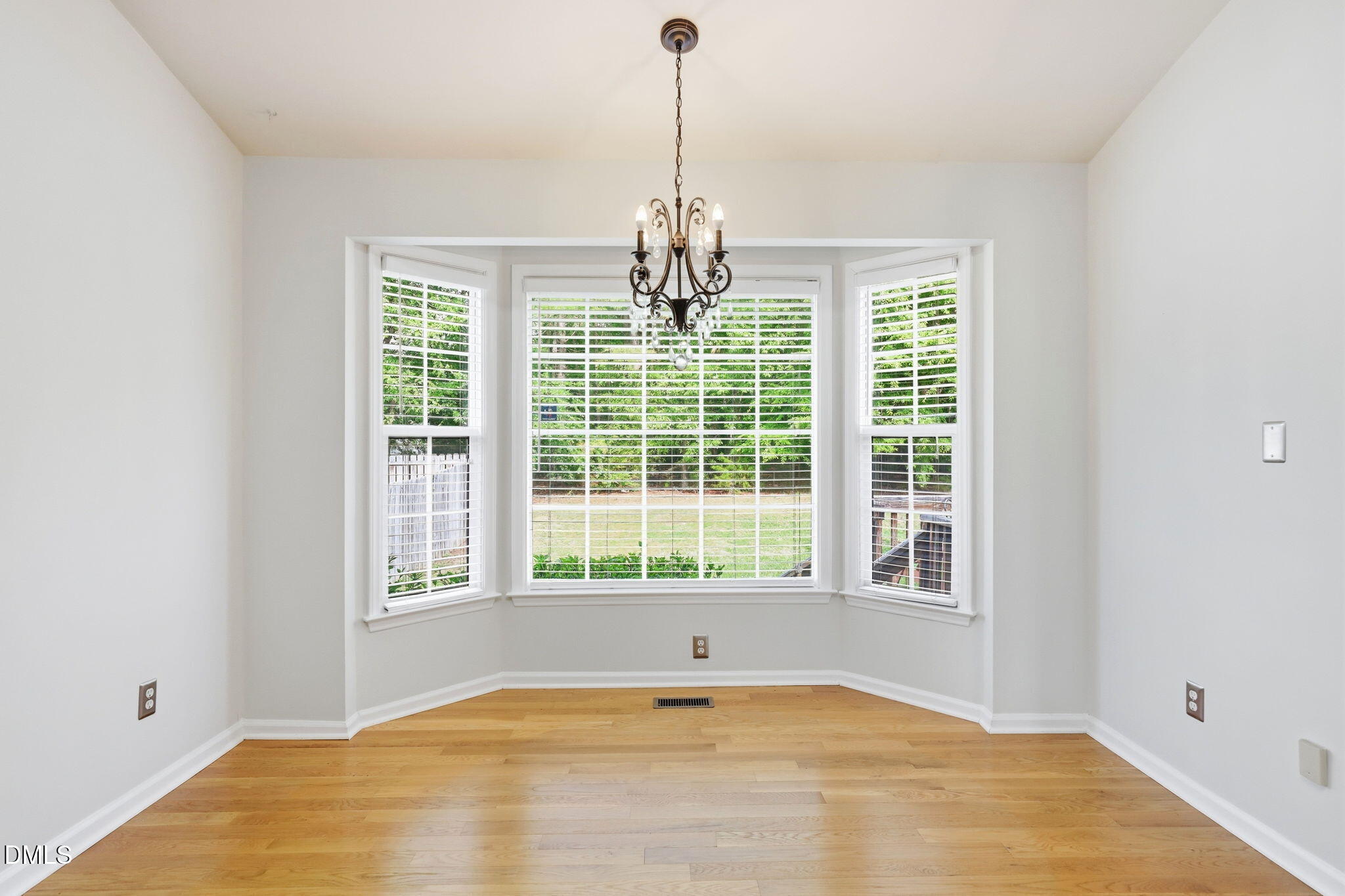 2912 Sedgefield Pines Lane Raleigh, NC 27604 - Photo 18 of 45 a view of an empty room with a window