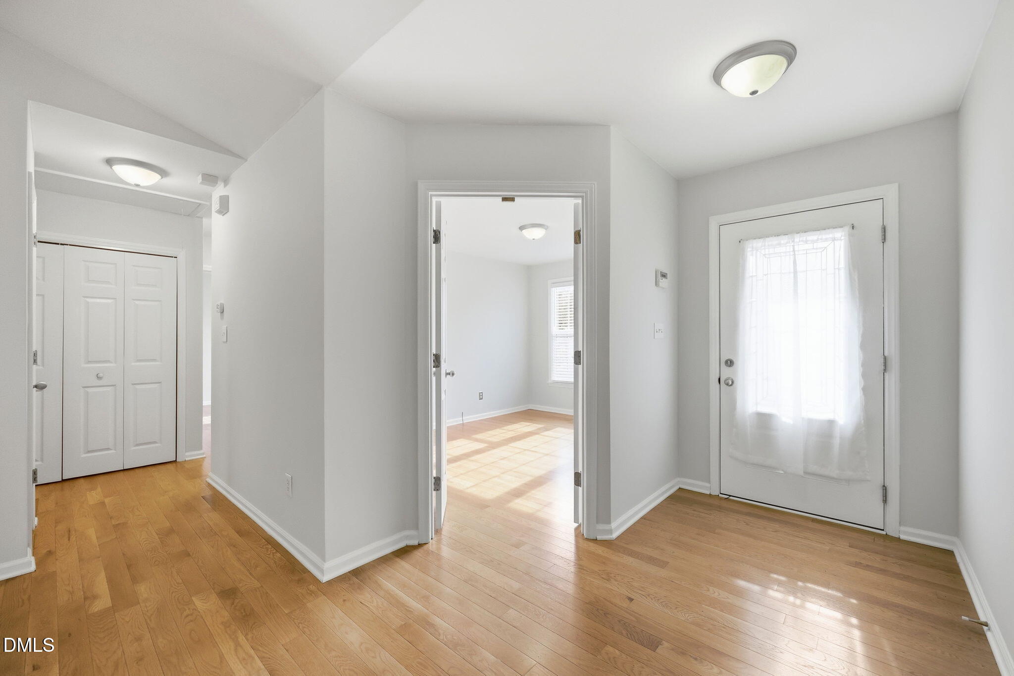 2912 Sedgefield Pines Lane Raleigh, NC 27604 - Photo 19 of 45 a view of a hallway with wooden floor