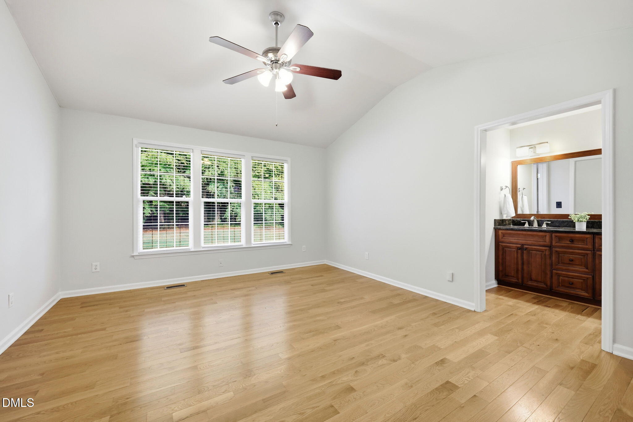 2912 Sedgefield Pines Lane Raleigh, NC 27604 - Photo 20 of 45 a view of an empty room with a kitchen