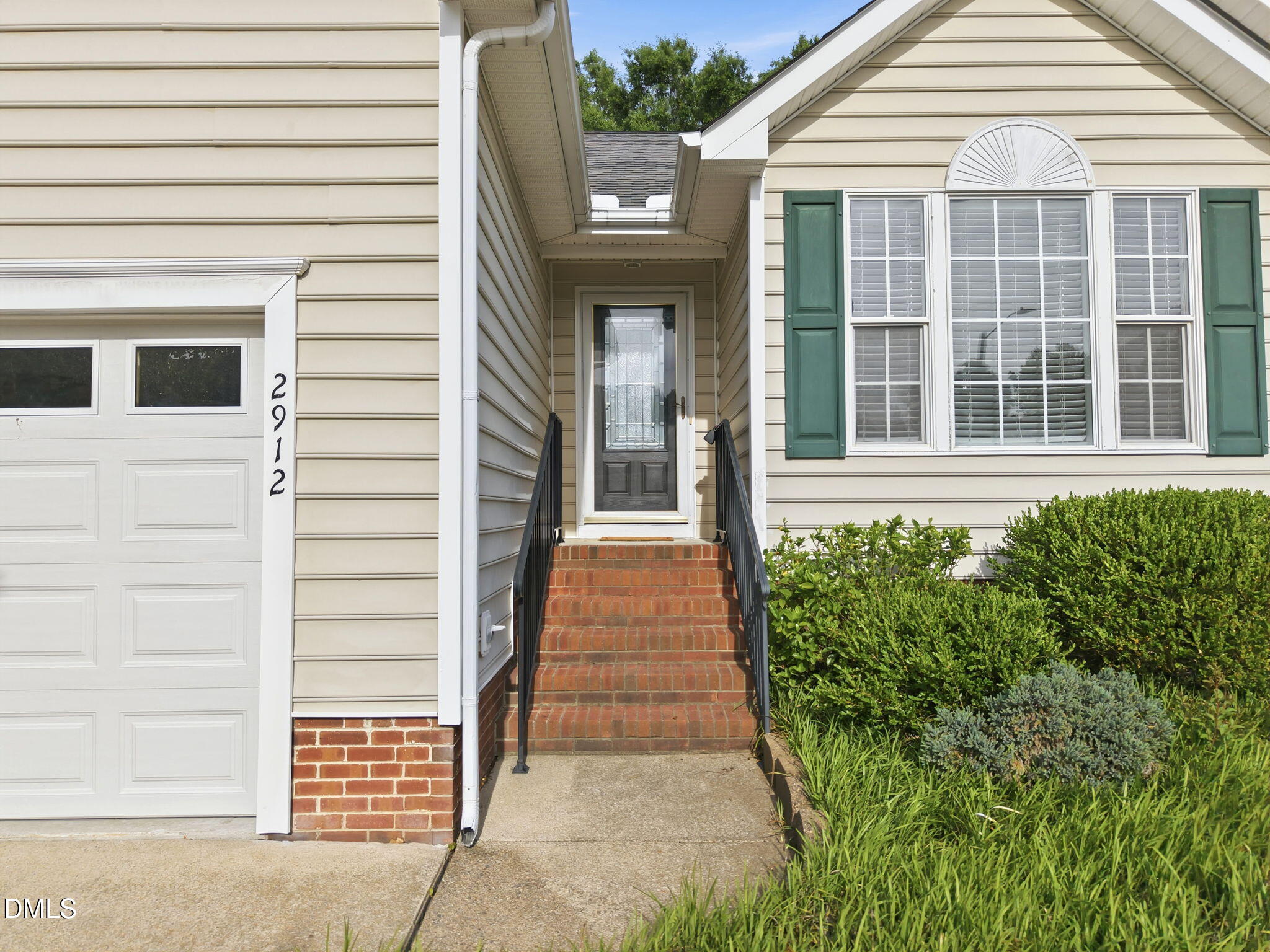 2912 Sedgefield Pines Lane Raleigh, NC 27604 - Photo 2 of 45 a front view of a house with a yard