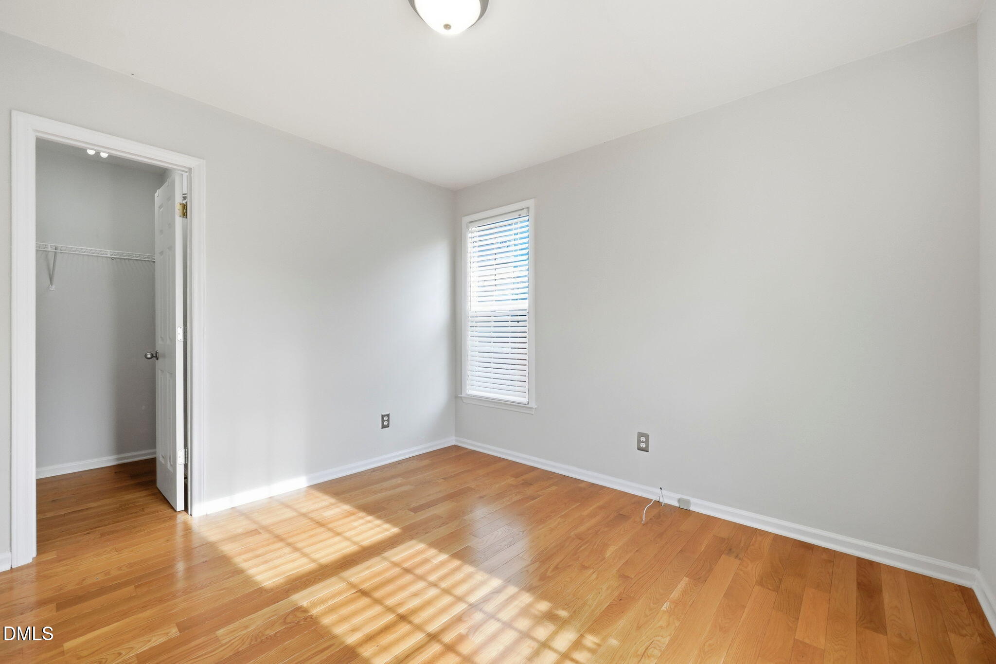 2912 Sedgefield Pines Lane Raleigh, NC 27604 - Photo 28 of 45 a view of empty room with wooden floor