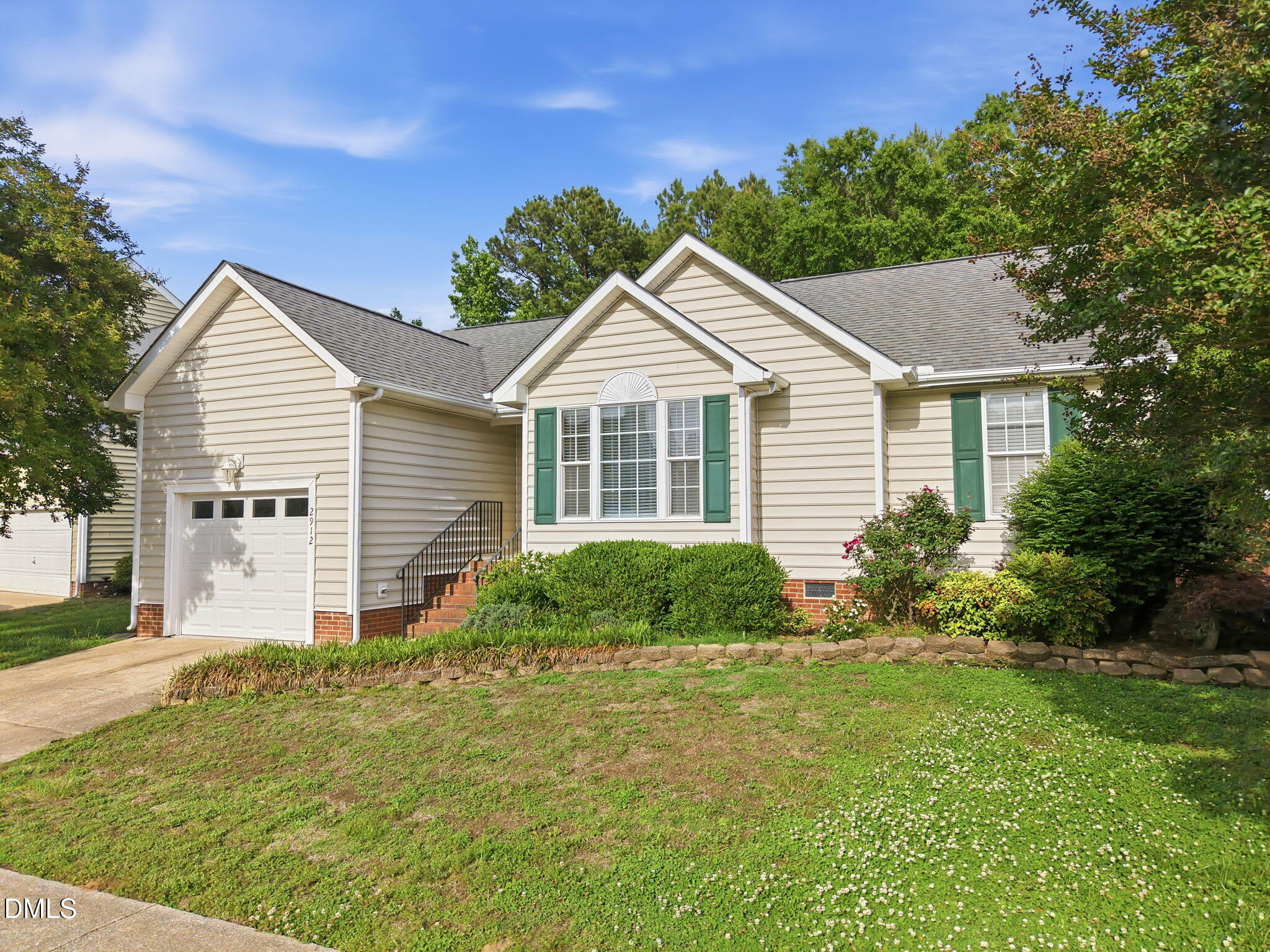 2912 Sedgefield Pines Lane Raleigh, NC 27604 - Photo 3 of 45 a front view of a house with garden