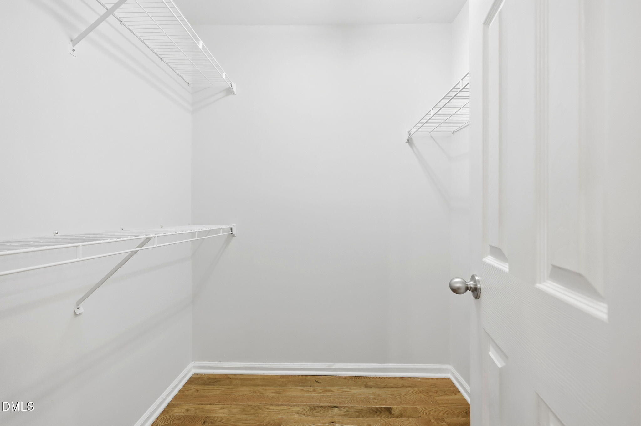 2912 Sedgefield Pines Lane Raleigh, NC 27604 - Photo 32 of 45 a view of a room with racks on the wall