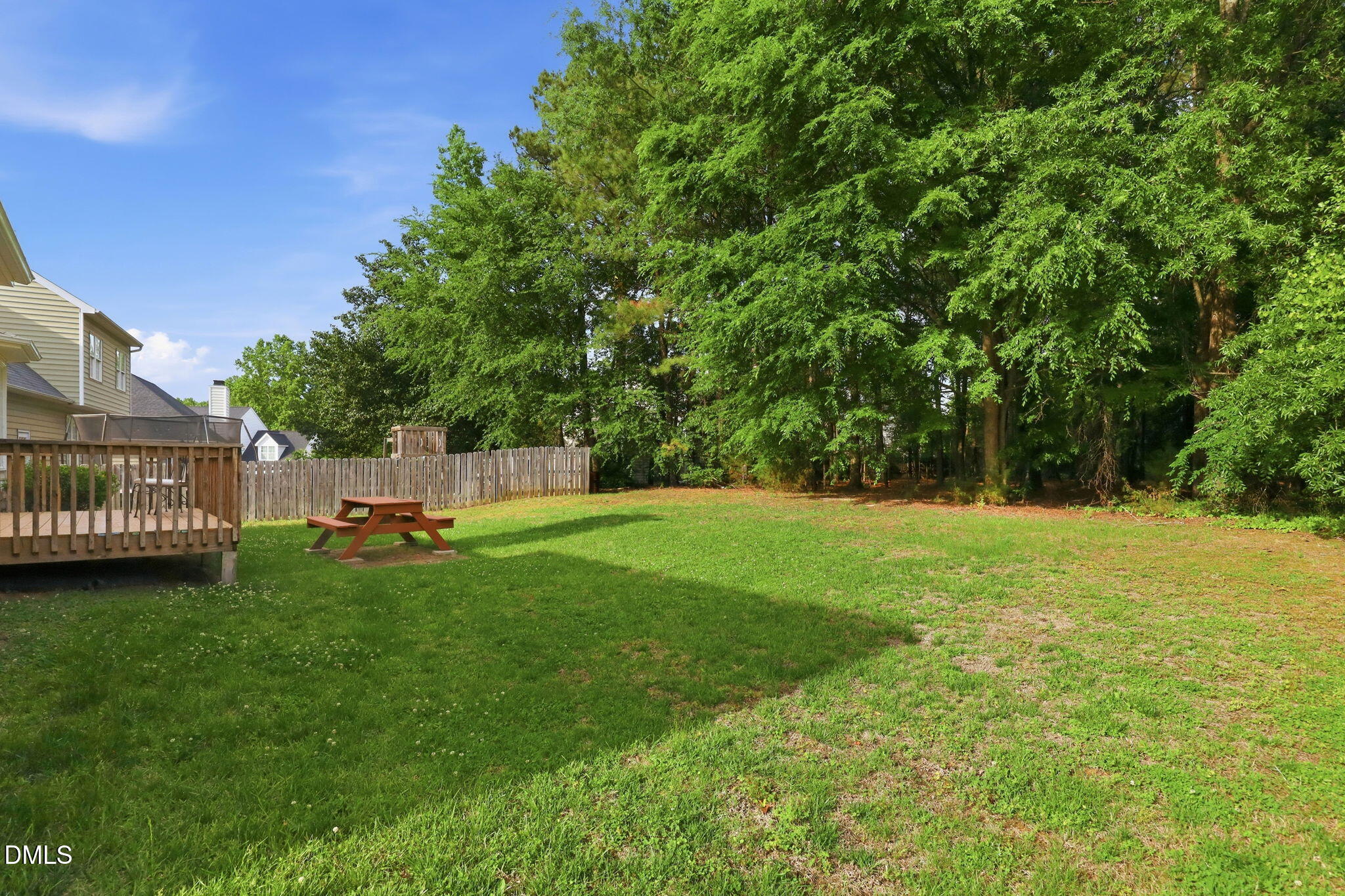 2912 Sedgefield Pines Lane Raleigh, NC 27604 - Photo 37 of 45 a view of a house with a yard and sitting area