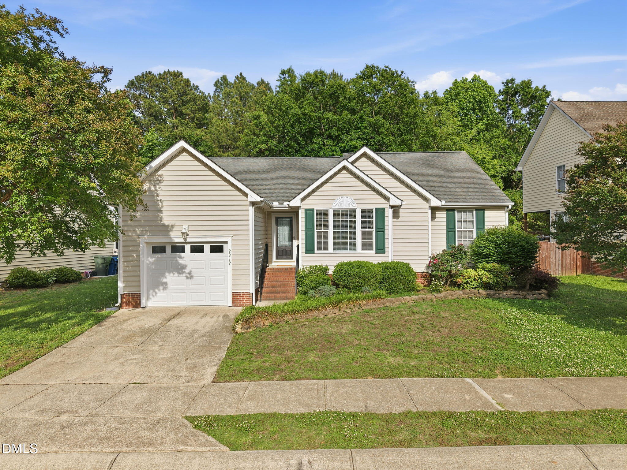 2912 Sedgefield Pines Lane Raleigh, NC 27604 - Photo 4 of 45 a front view of a house with a yard