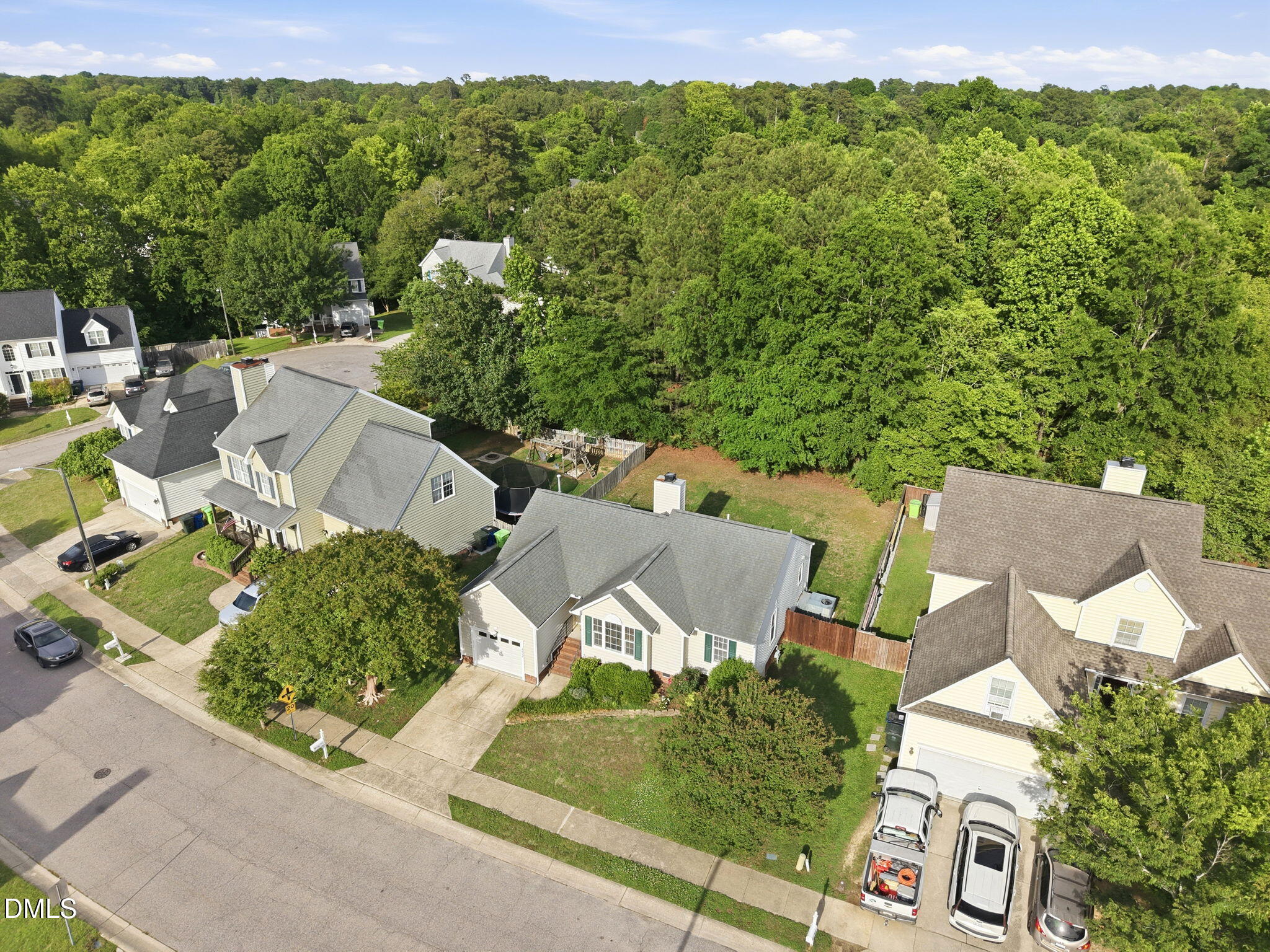 2912 Sedgefield Pines Lane Raleigh, NC 27604 - Photo 42 of 45 an aerial view of a house with garden space and street view