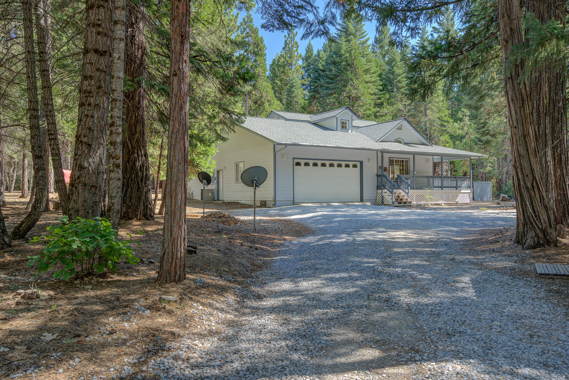 8303 Amberwoods Place Shingletown, CA 96088 - Photo 1 of 58 a view of house with a outdoor space