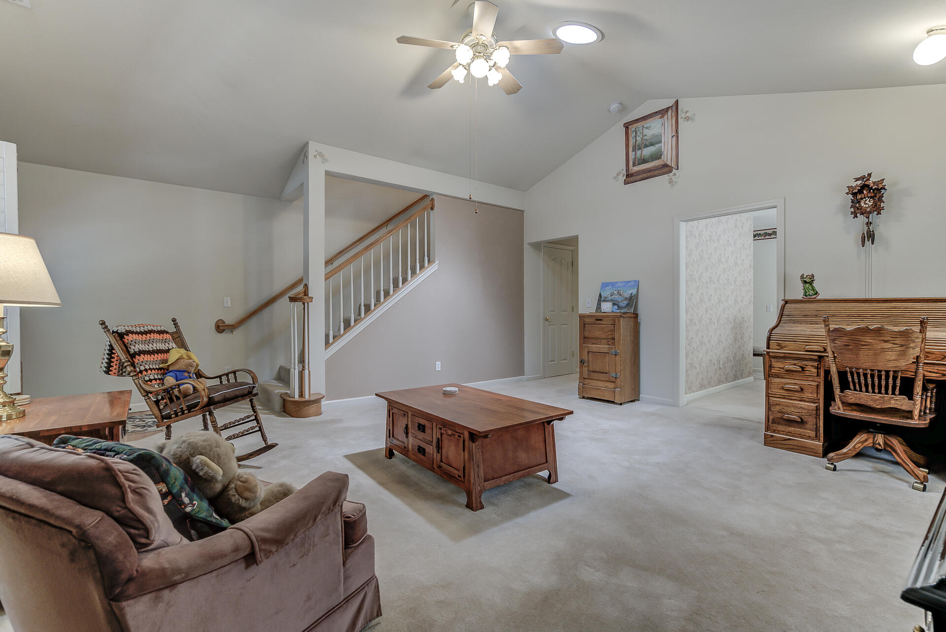 8303 Amberwoods Place Shingletown, CA 96088 - Photo 11 of 58 a living room with furniture and a chandelier