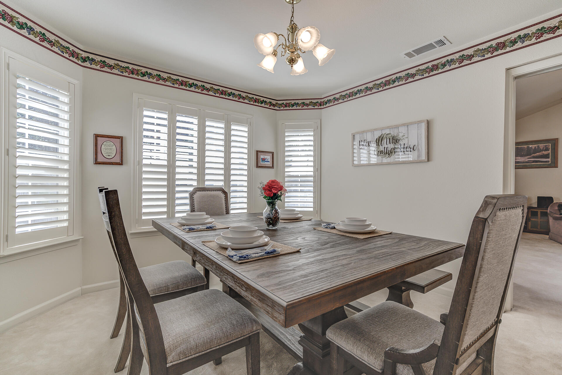 8303 Amberwoods Place Shingletown, CA 96088 - Photo 13 of 58 a view of a dining room with furniture window and outside view