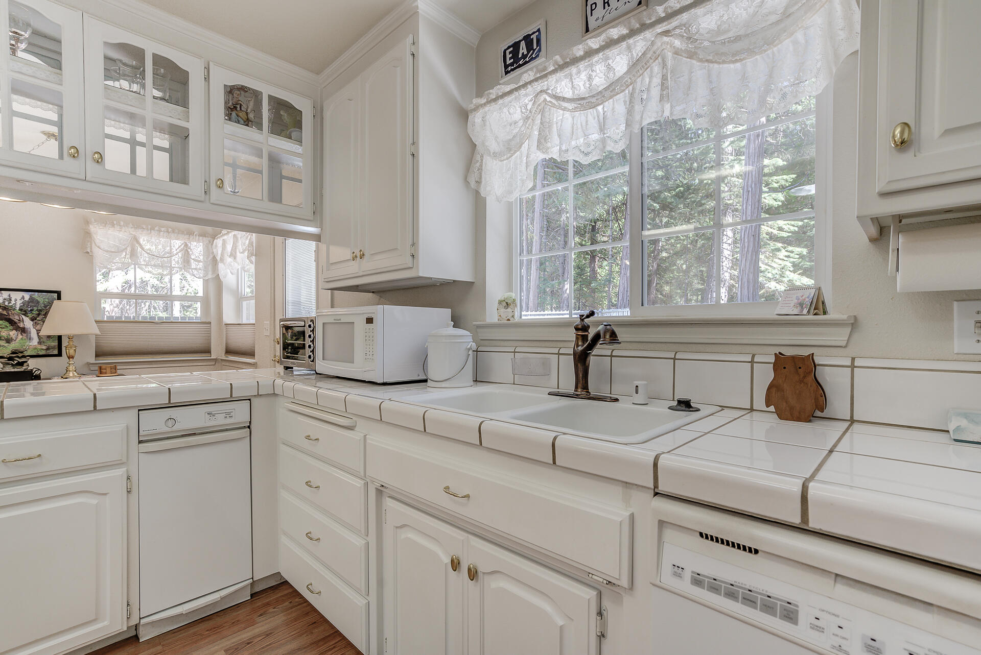 8303 Amberwoods Place Shingletown, CA 96088 - Photo 20 of 58 a living room with furniture and large windows