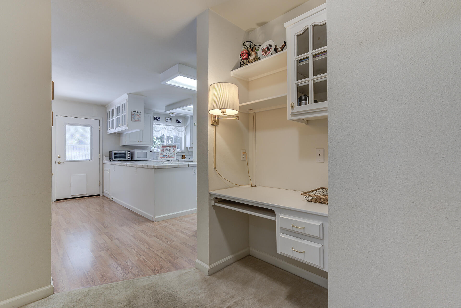 8303 Amberwoods Place Shingletown, CA 96088 - Photo 27 of 58 a view of kitchen and wooden cabinets