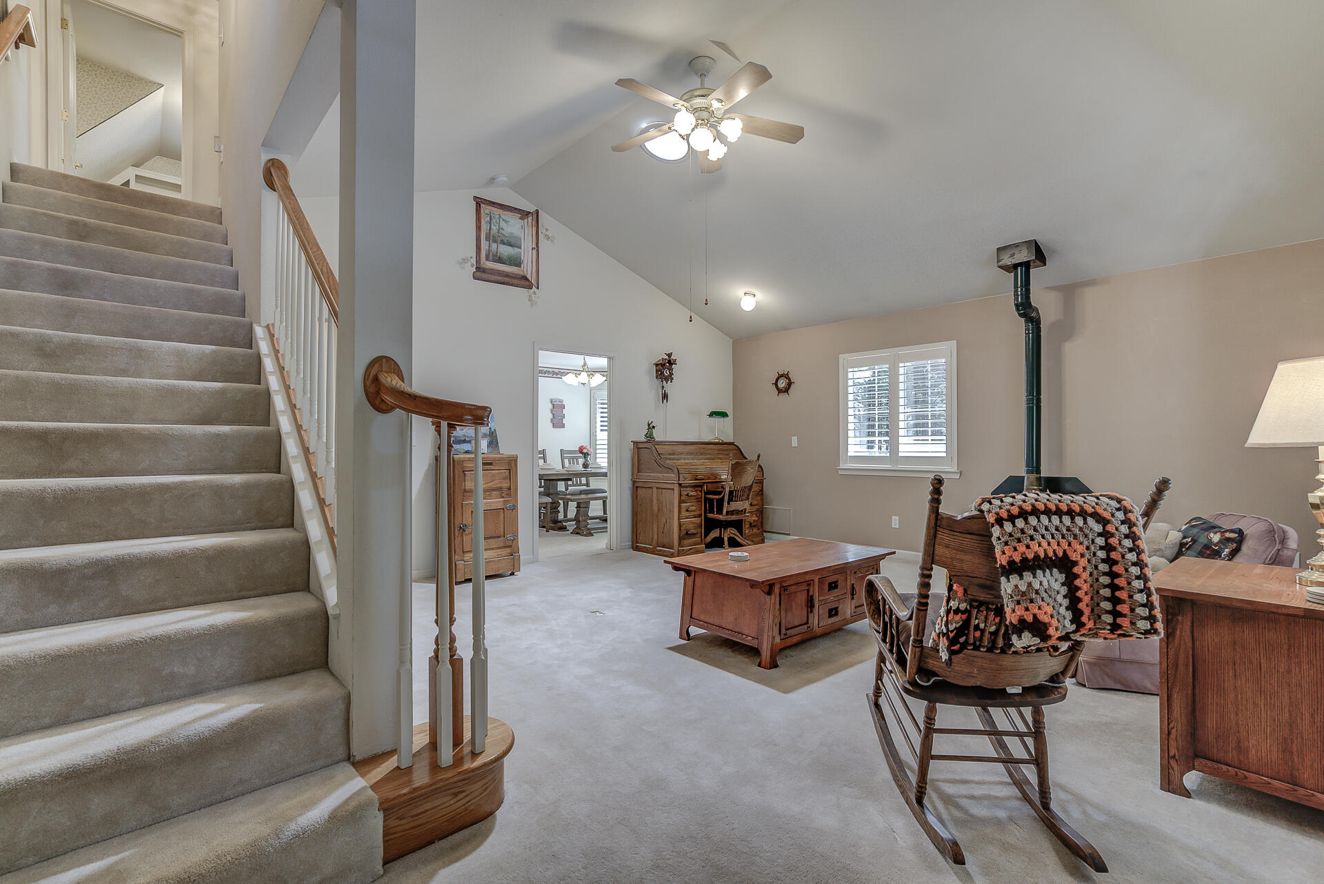 8303 Amberwoods Place Shingletown, CA 96088 - Photo 40 of 58 a view of a livingroom with furniture and staircase