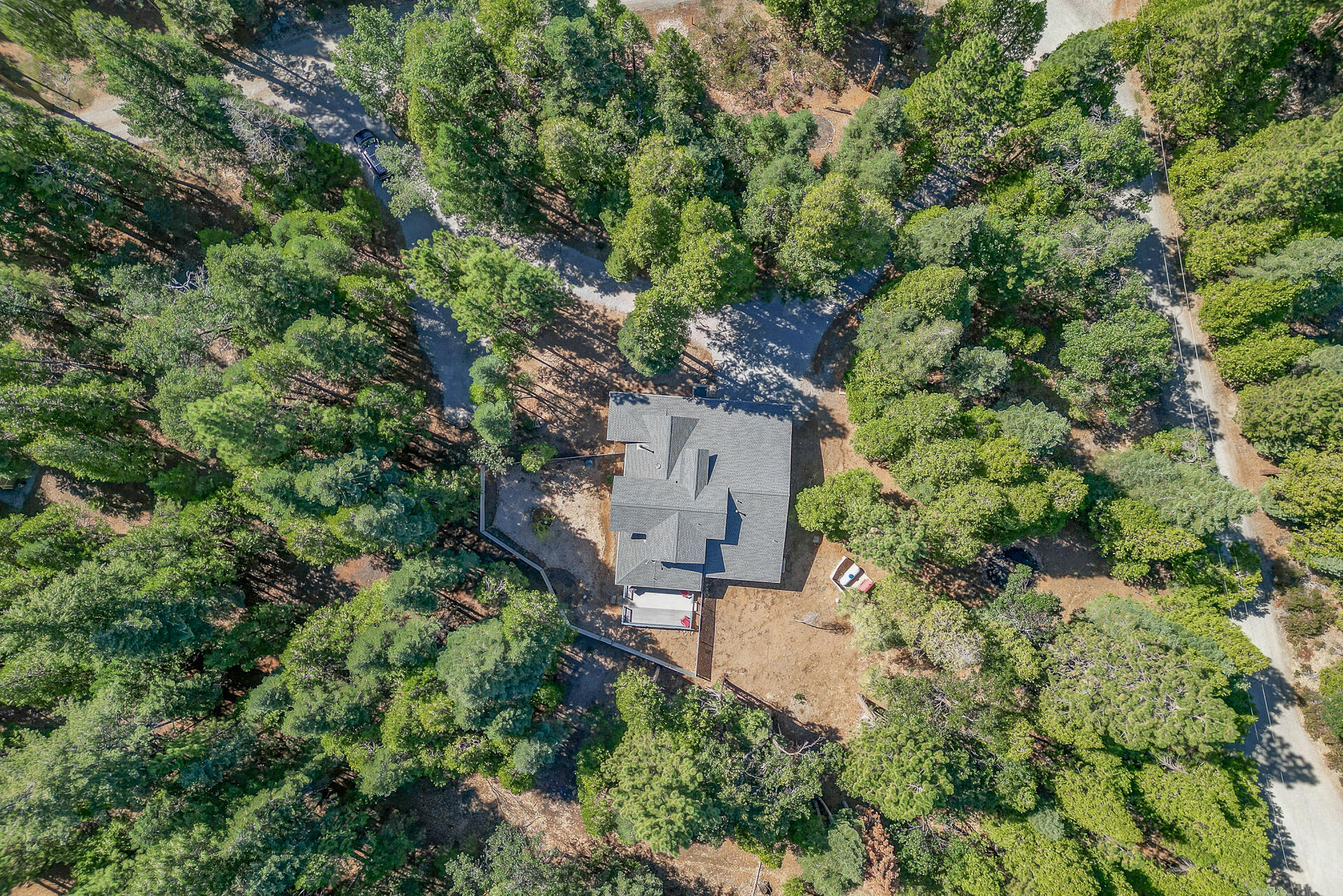8303 Amberwoods Place Shingletown, CA 96088 - Photo 4 of 58 an aerial view of a house with a yard