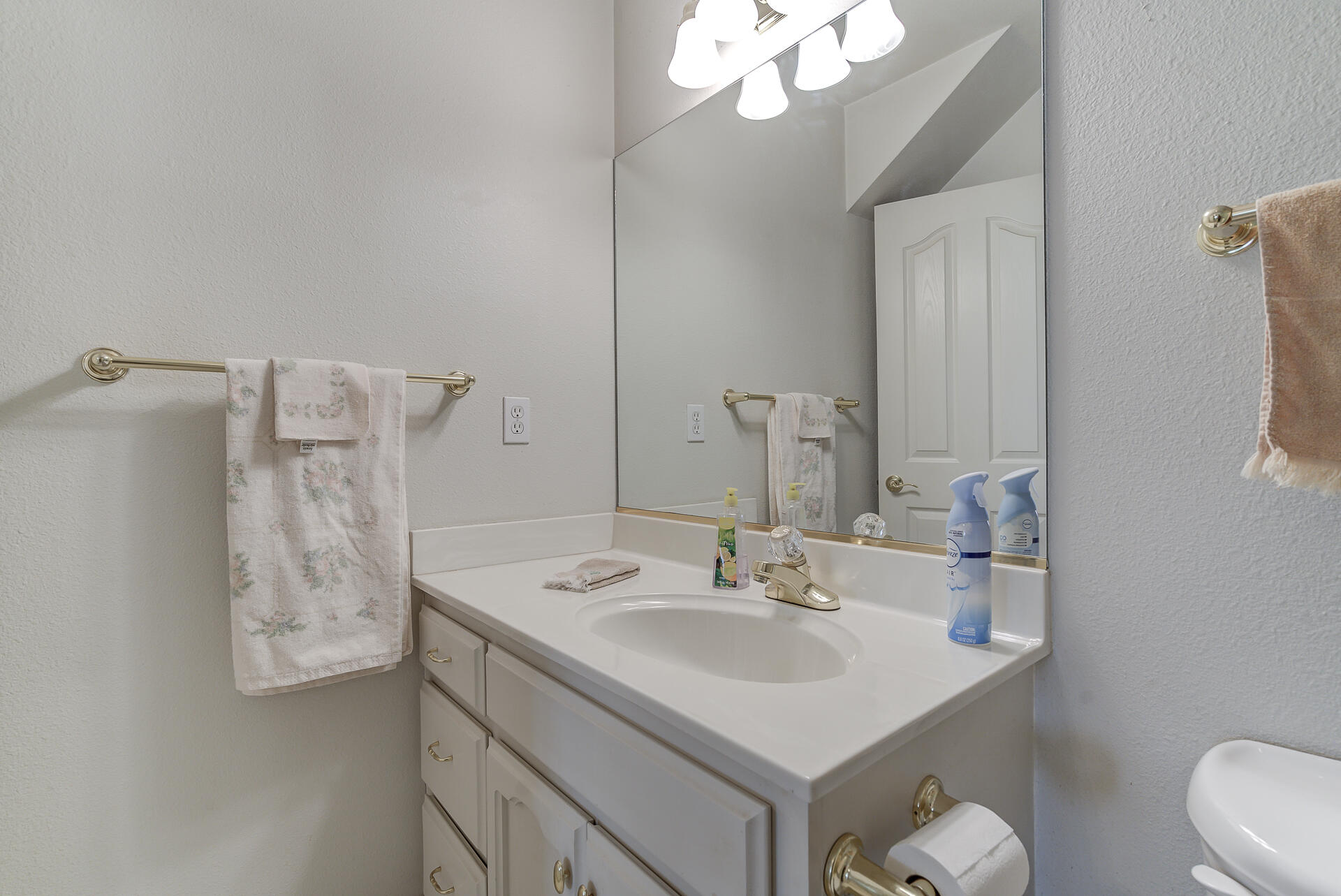 8303 Amberwoods Place Shingletown, CA 96088 - Photo 43 of 58 a bathroom with a sink vanity and a mirror