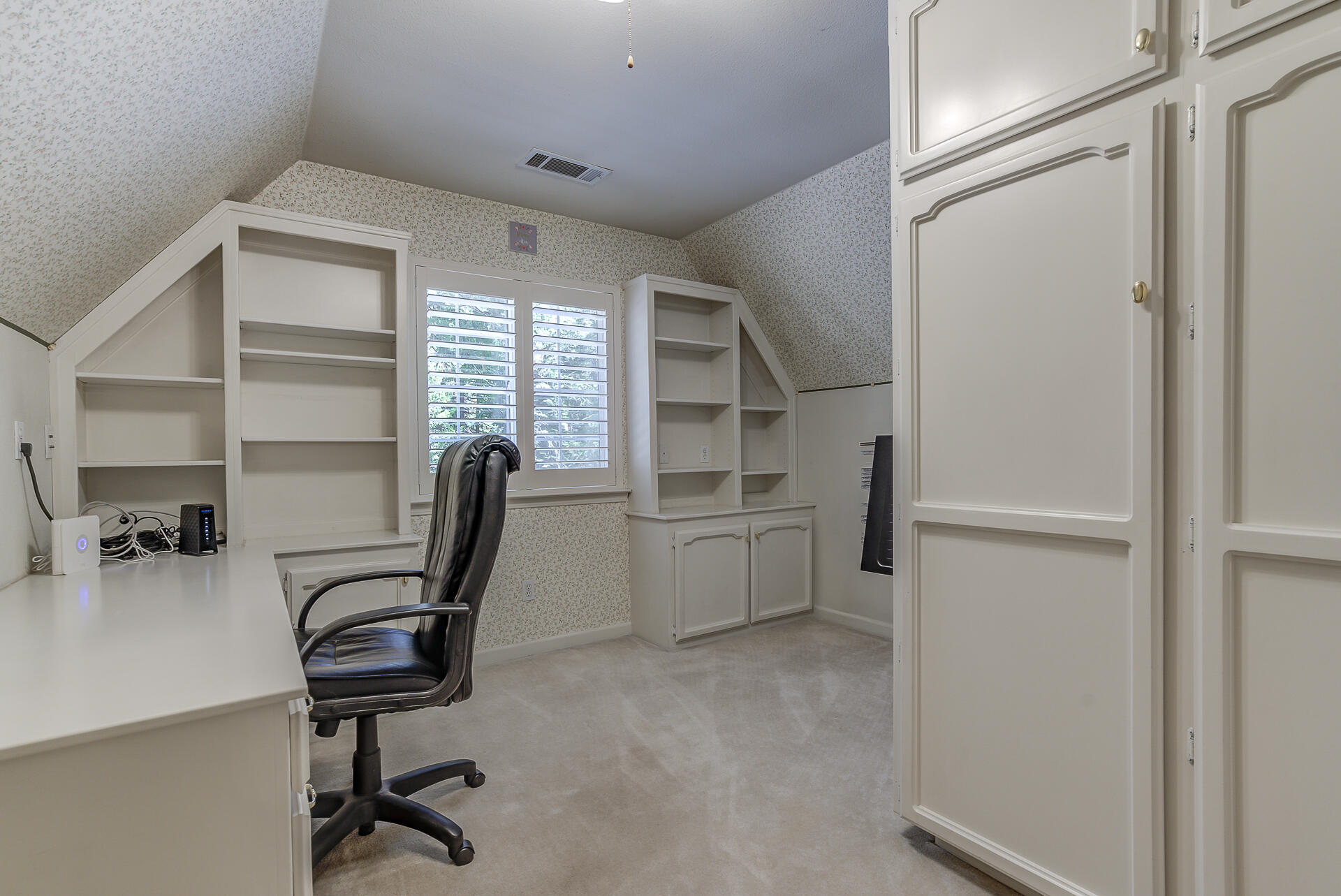 8303 Amberwoods Place Shingletown, CA 96088 - Photo 45 of 58 a view of a workspace with furniture and a window