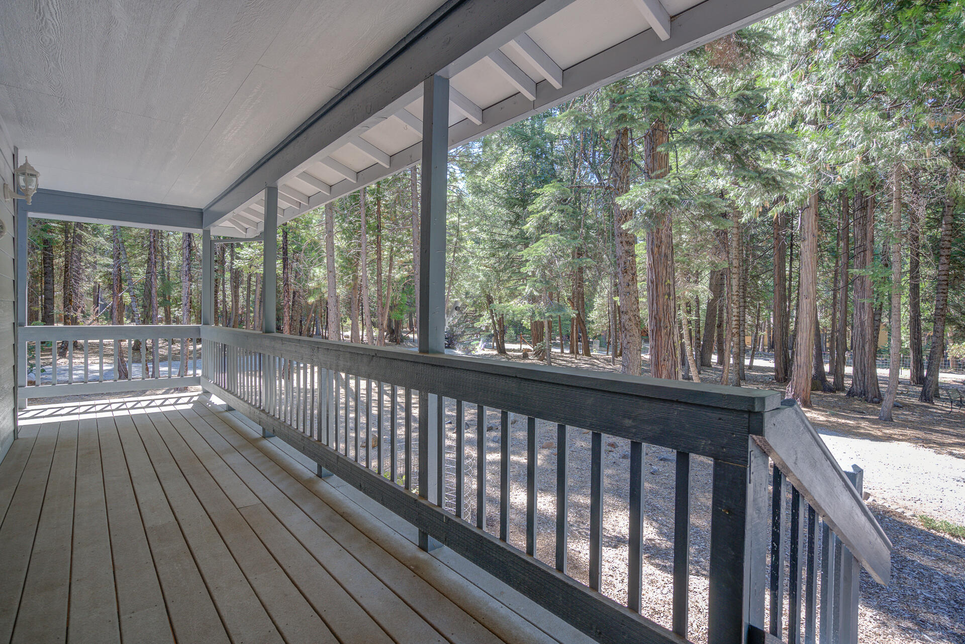8303 Amberwoods Place Shingletown, CA 96088 - Photo 8 of 58 a view of balcony with wooden floor