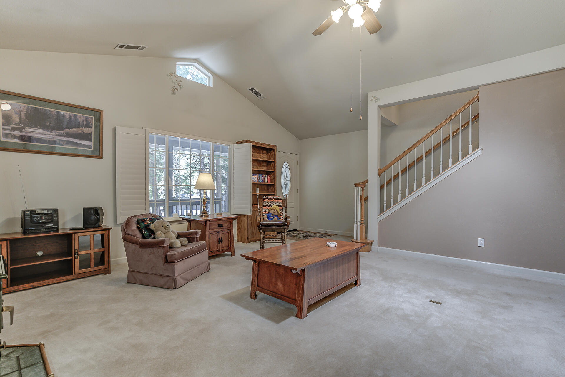 8303 Amberwoods Place Shingletown, CA 96088 - Photo 10 of 58 a living room with furniture and a window