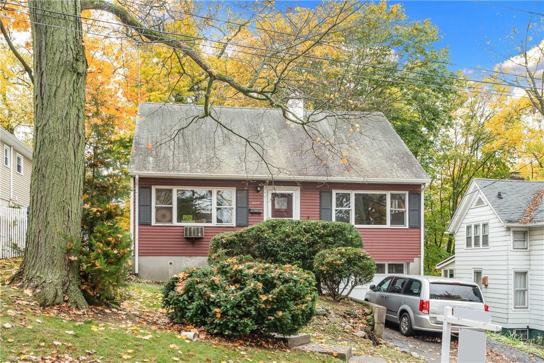 a front view of a house with yard