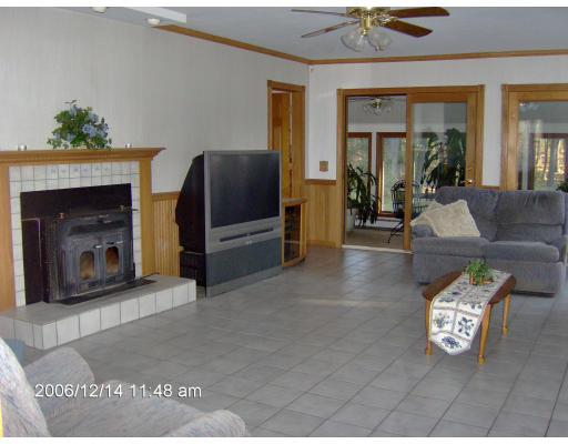 135 Rider Road Westfield, MA 01085 - Photo 11 of 16 a living room with furniture and a fireplace