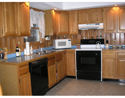 135 Rider Road Westfield, MA 01085 - Photo 12 of 16 a kitchen with a sink cabinets and window