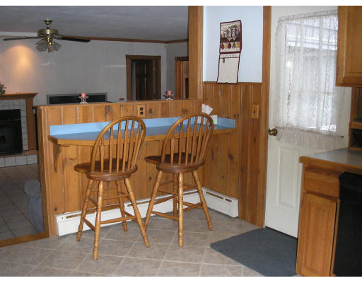 135 Rider Road Westfield, MA 01085 - Photo 14 of 16 a view of a dining area with furniture and chandelier