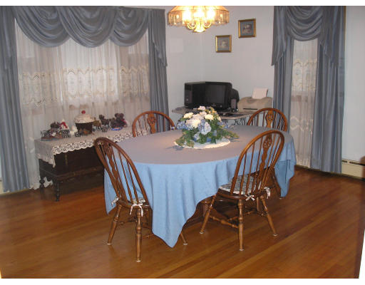 135 Rider Road Westfield, MA 01085 - Photo 16 of 16 a view of a dining room with furniture and wooden floor