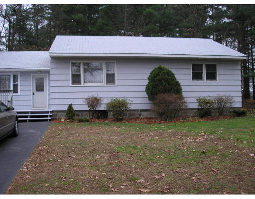 135 Rider Road Westfield, MA 01085 - Photo 2 of 16 a backyard of a house with lots of green space