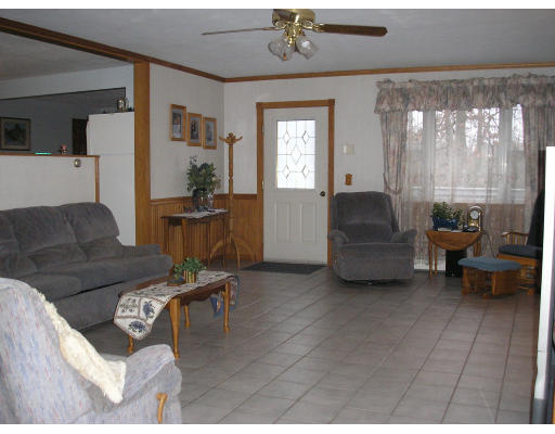 135 Rider Road Westfield, MA 01085 - Photo 9 of 16 a living room with furniture and a window
