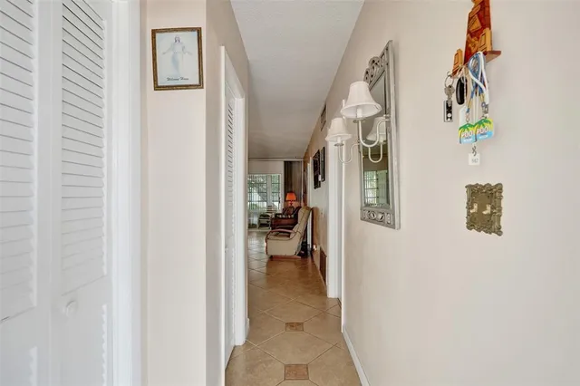 a view of hallway with livingroom and hallway